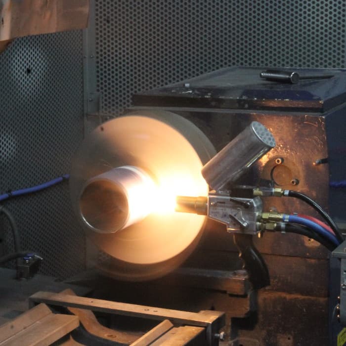 METAL SPRAY PROCESS BRINGS WORN COMPONENTS BACK TO SPEC Industry