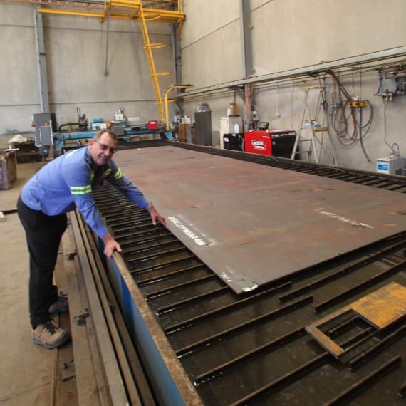 Tom Woods with the new plasma cutting technology
