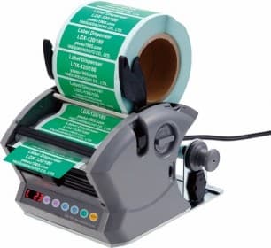 Tape and film dispensers present and cut pre-programmed lengths of material ready for pick up. The length of the material can easily be changed and some models have a number of easily selectable programmable lengths.
